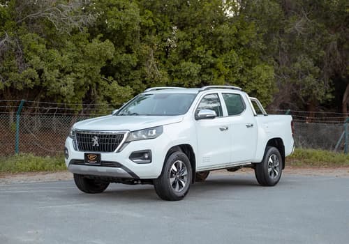 Used 2023 Peugeot Landtrek Double Cabin in White – Left Front Diagonal (45°) View for Sale at First Choice Cars Dubai Sharjah