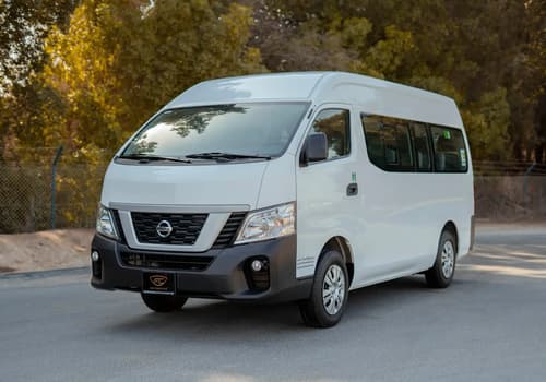 Used 2019 Nissan Urvan High Roof in White – Left Front Diagonal (45°) View for Sale at First Choice Cars Dubai Sharjah