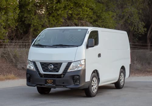 Used 2022 Nissan Urvan Standard Roof in White – Left Front Diagonal (45°) View for Sale at First Choice Cars Dubai Sharjah