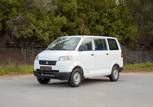 Used 2013 Suzuki APV Passanger Van in White – Left Front Diagonal (45°) View for Sale at First Choice Cars Dubai Sharjah