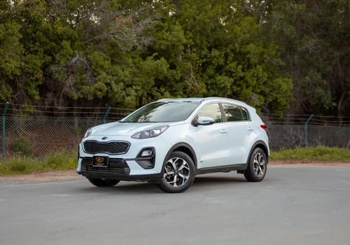 Used 2019 Kia Sportage LX in White – Left Front Diagonal (45°) View for Sale at First Choice Cars Dubai Sharjah