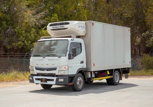 Used 2020 Mitsubishi Canter Chiller Box in White – Left Front Diagonal (45°) View for Sale at First Choice Cars Dubai Sharjah