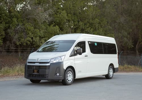 Used 2025 Toyota Hiace GLX High Roof in White – Left Front Diagonal (45°) View for Sale at First Choice Cars Dubai Sharjah