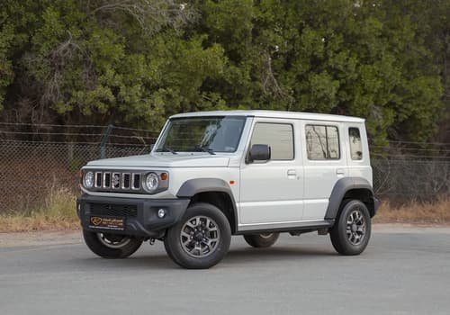 Used 2024 Suzuki Jimny GLX in White – Left Front Diagonal (45°) View for Sale at First Choice Cars Dubai Sharjah