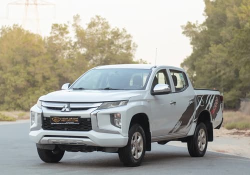 Used 2020 Mitsubishi L200 GLX Double Cabin in White – Left Front Diagonal (45°) View for Sale at First Choice Cars Dubai Sharjah