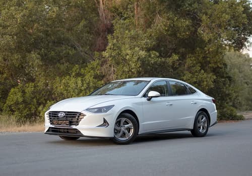 Used 2023 Hyundai Sonata Comfort in White – Left Front Diagonal (45°) View for Sale at First Choice Cars Dubai Sharjah