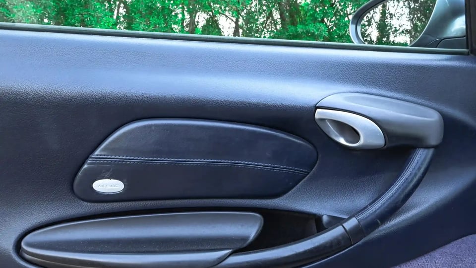 Used 2004 Porsche Boxster S Variant in Silver – Driver Door Panel Full View for Sale at First Choice Cars Dubai Sharjah