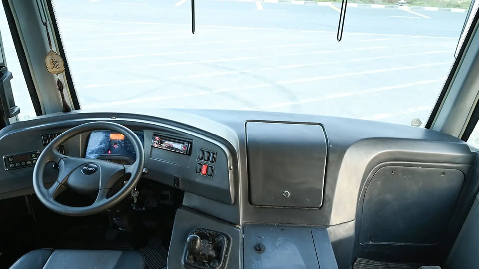 Used 2020 Mitsubishi Fuso BA 37-Seater in White – Front Cabin / Dashboard Full View for Sale at First Choice Cars Dubai Sharjah