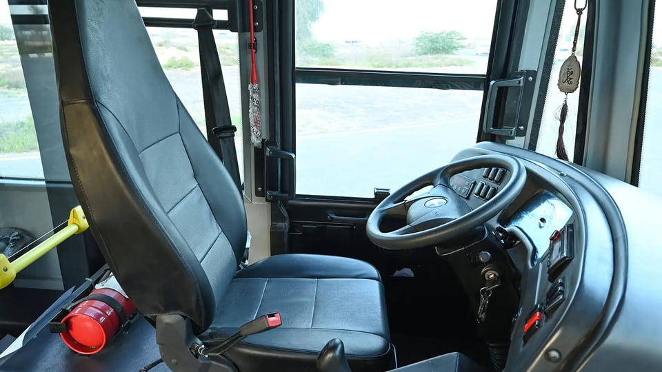 Used 2020 Mitsubishi Fuso BA 37-Seater in White – Front Driver Side Cabin View for Sale at First Choice Cars Dubai Sharjah