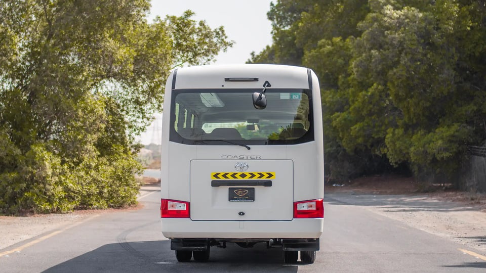 Used 2020 Toyota Coaster Bus in White – Back/Rear View for Sale at First Choice Cars Dubai Sharjah