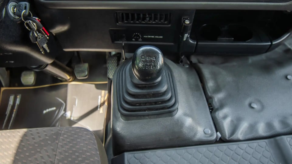 Used 2020 Toyota Coaster Bus in White – Center Console & Gear Shifter for Sale at First Choice Cars Dubai Sharjah