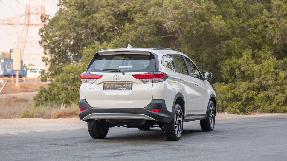 Used 2023 Toyota Rush EX in White – Right Back Diagonal (45°) View for Sale at First Choice Cars Dubai Sharjah