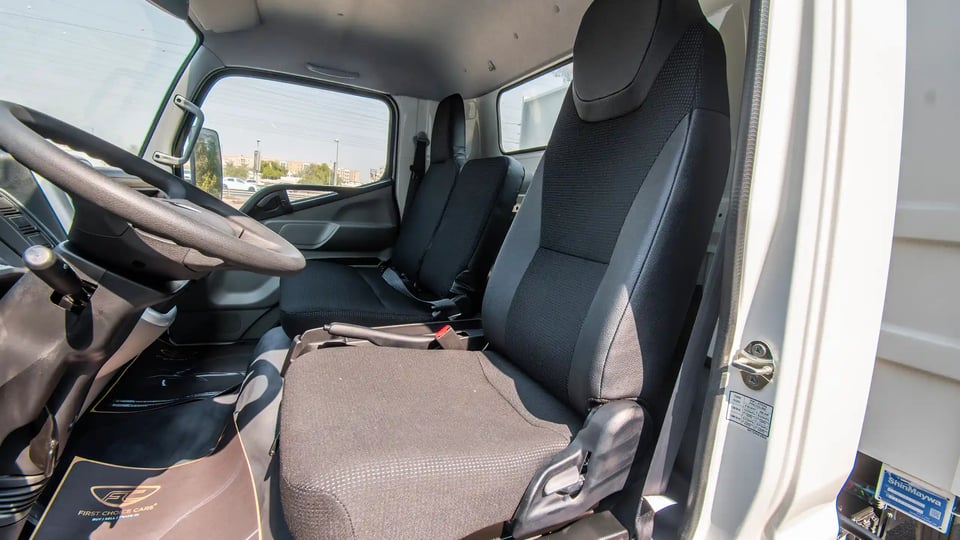 Used 2024 Mitsubishi Canter Tipper in White – Front Driver Side Cabin View for Sale at First Choice Cars Dubai Sharjah