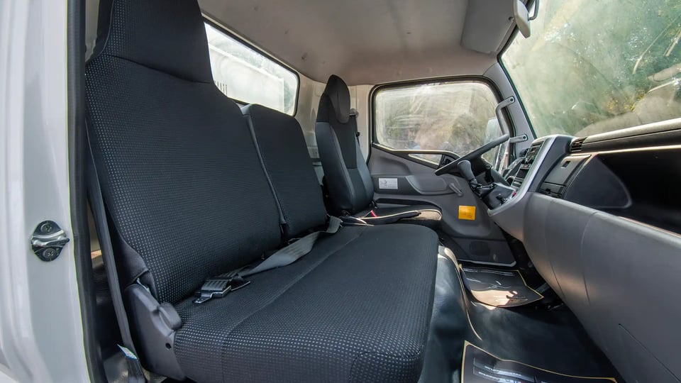 Used 2024 Mitsubishi Canter Tipper in White – Front Passenger Side Cabin View for Sale at First Choice Cars Dubai Sharjah