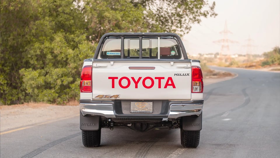 Used 2024 Toyota Hilux DLX Double Cabin in White – Back/Rear View for Sale at First Choice Cars Dubai Sharjah
