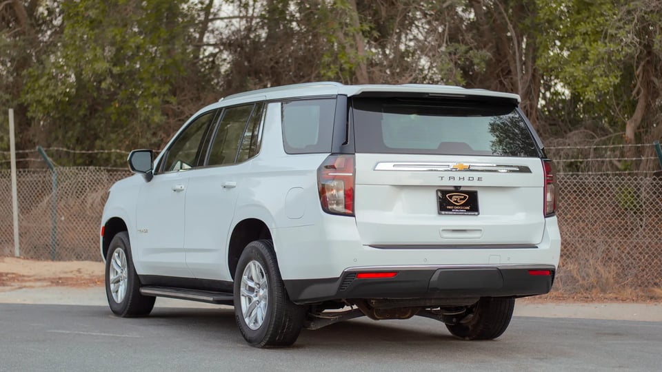 Used 2023 Chevrolet Tahoe LS in White – Left Back Diagonal (45°) View for Sale at First Choice Cars Dubai Sharjah