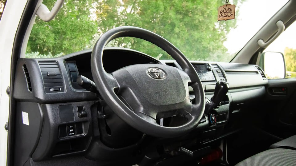 Used 2022 Toyota Hiace GL Standard Roof White – Driver Side Dashboard & Steering View at First Choice Cars Sharjah