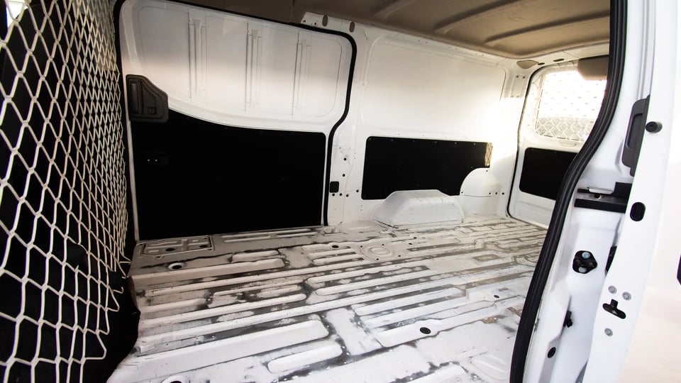 Used 2022 Nissan Urvan Standard Roof White – Delivery Box Right Side Interior View at First Choice Cars Sharjah