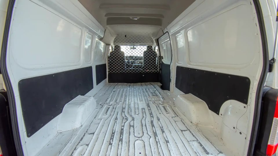 Used 2022 Nissan Urvan High Roof in White – Delivery Box Rear Opening View for Sale at First Choice Cars Dubai Sharjah