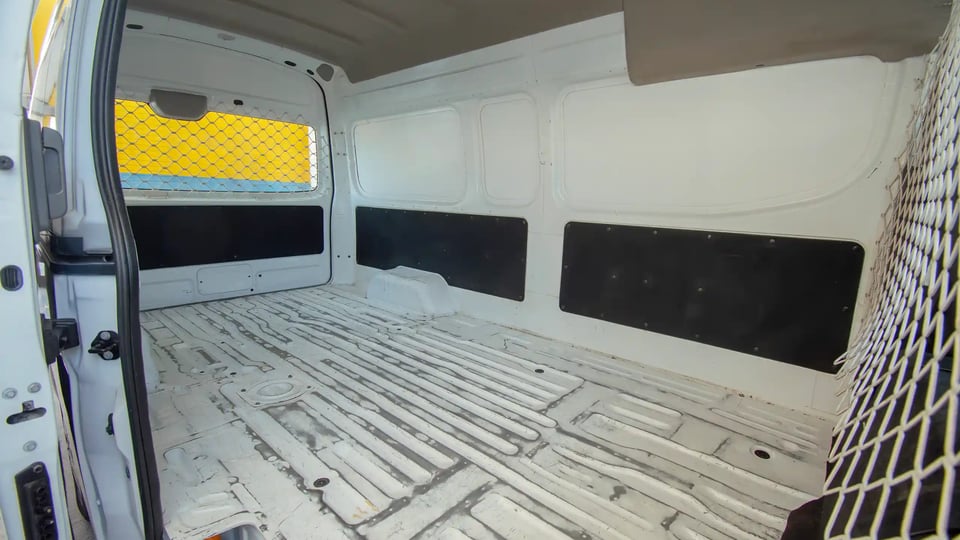 Used 2022 Nissan Urvan High Roof in White – Delivery Box Right Side Interior View for Sale at First Choice Cars Dubai Sharjah