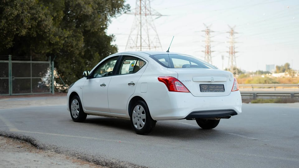 Used 2022 Nissan Sunny SV in White – Left Back Diagonal (45°) View for Sale at First Choice Cars Dubai Sharjah