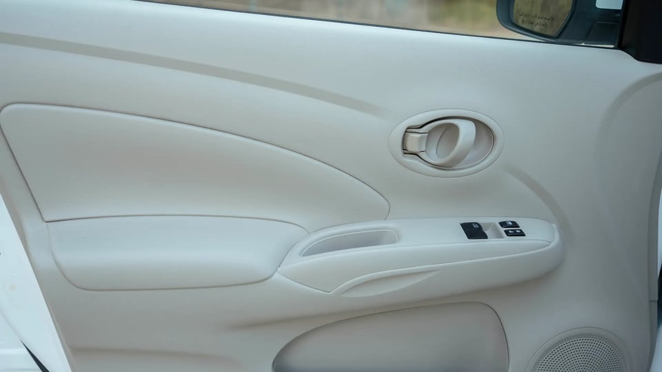 Used 2022 Nissan Sunny SV in White – Driver Door Panel Full View for Sale at First Choice Cars Dubai Sharjah