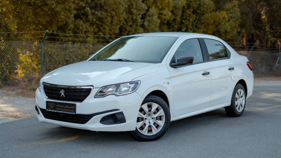 Used 2021 Peugeot 301 Allure in White – Left Front Diagonal (45°) View for Sale at First Choice Cars Dubai Sharjah
