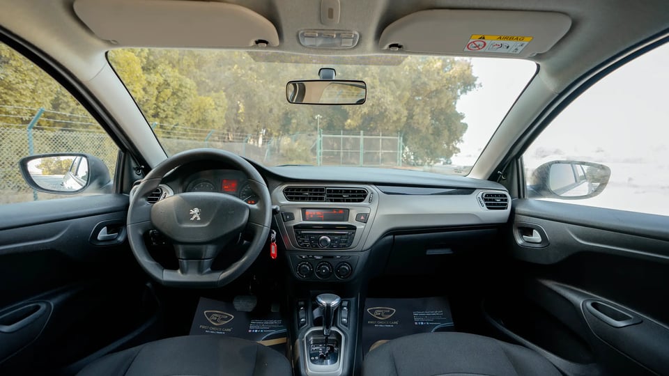 Used 2021 Peugeot 301 Allure in White – Front Cabin / Dashboard Full View for Sale at First Choice Cars Dubai Sharjah