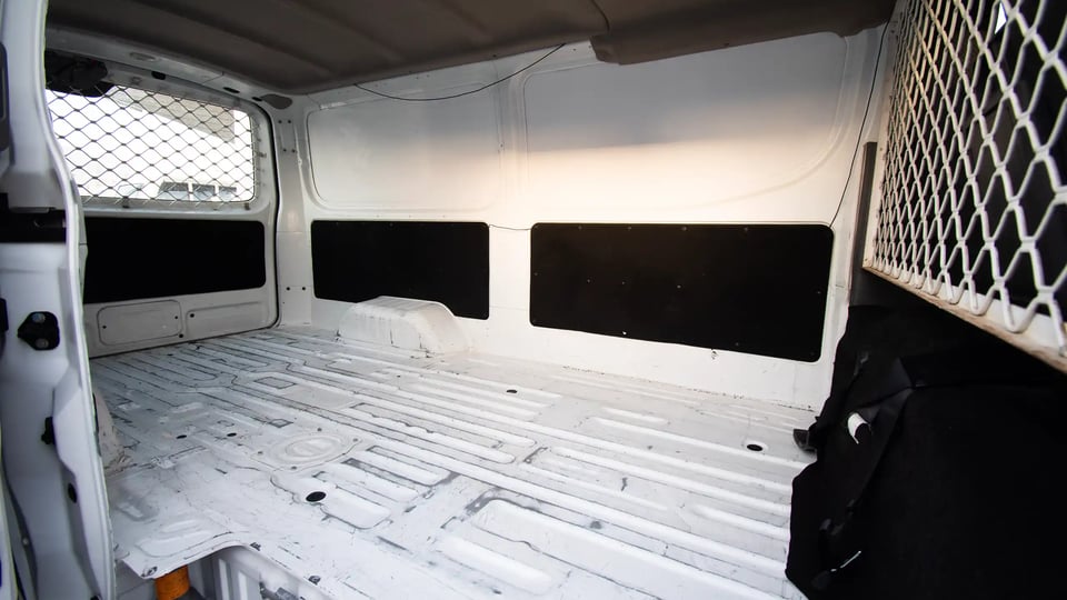 Used 2021 Nissan Urvan Standard Roof in White – Delivery Box Right Side Interior View for Sale at First Choice Cars Dubai Sharjah