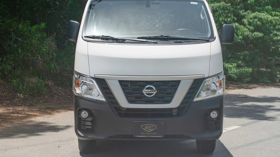 Used 2021 Nissan Urvan Standard Roof in White – Front View for Sale at First Choice Cars Dubai Sharjah