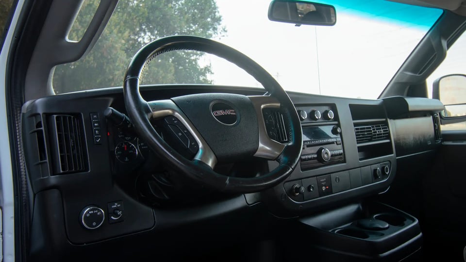 Used 2019 GMC Savana 3500 in White – Driver Side Dashboard & Steering View for Sale at First Choice Cars Dubai Sharjah