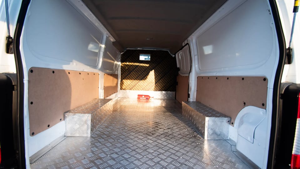 Used 2016 Nissan Urvan Standard Roof in White – Delivery Box Rear Opening View for Sale at First Choice Cars Dubai Sharjah