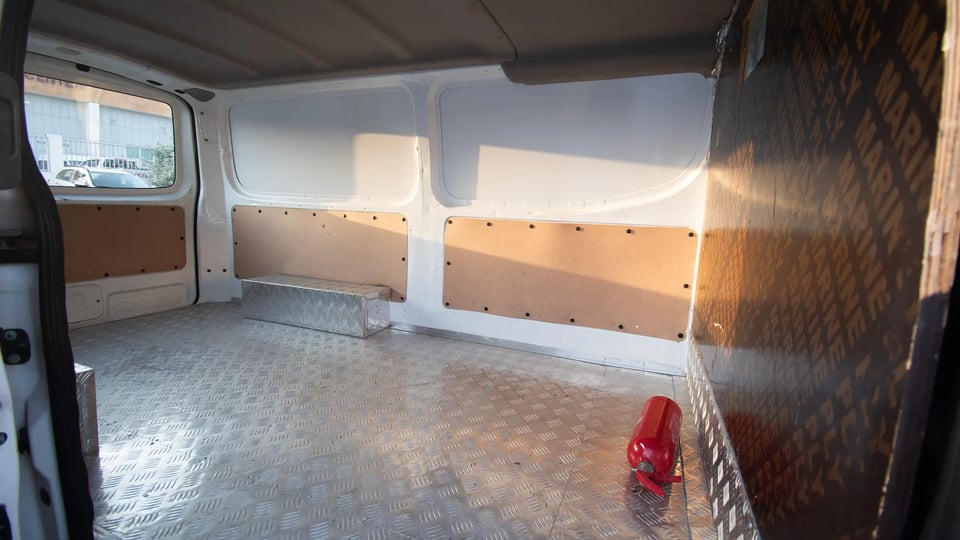 Used 2016 Nissan Urvan Standard Roof in White – Delivery Box Right Side Interior View for Sale at First Choice Cars Dubai Sharjah