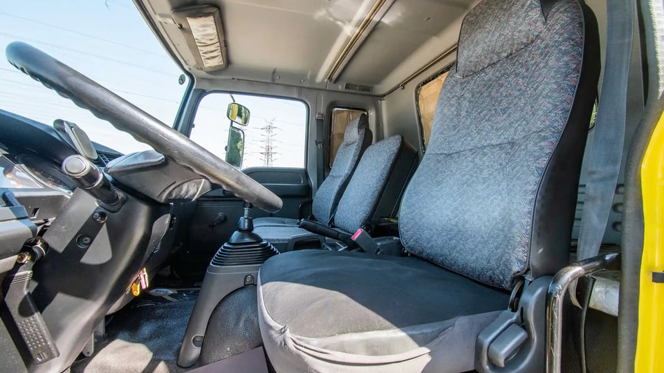 Used 2016 Isuzu FSR Cargo Body in Yellow – Front Driver Side Cabin View for Sale at First Choice Cars Dubai Sharjah