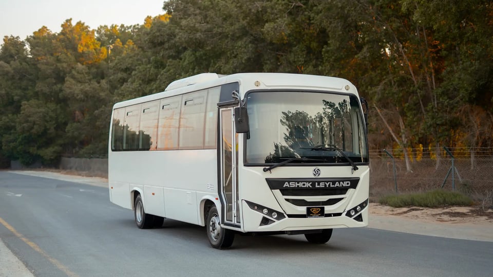Used 2022 Ashok Leyland Oyster Bus in White – Rear Left Side with Door Open View for Sale at First Choice Cars Dubai Sharjah