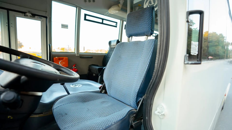 Used 2022 Ashok Leyland Oyster Bus in White – Front Driver Side Cabin View for Sale at First Choice Cars Dubai Sharjah