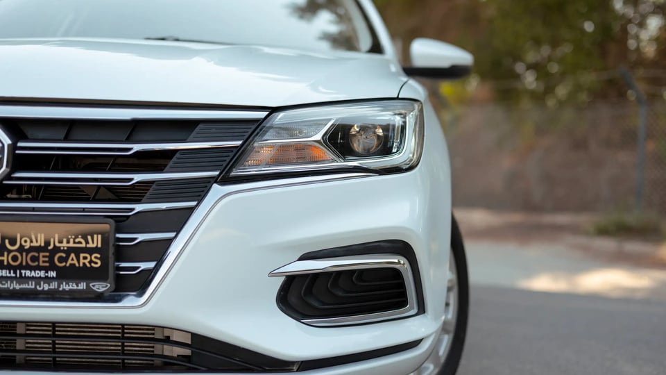 Used 2022 MG 5 Comfort White – Headlight Close-up at First Choice Cars Sharjah