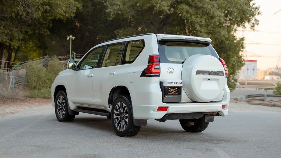Used 2022 Toyota Prado GXR in White – Left Back Diagonal (45°) View for Sale at First Choice Cars Dubai Sharjah
