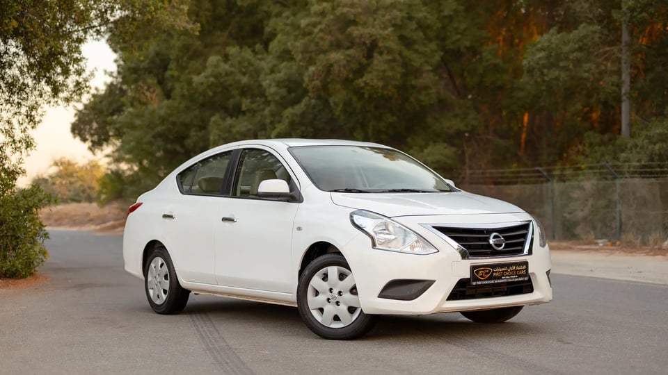 Used 2024 Nissan Sunny SV in White – Right Front Diagonal (45°) View for Sale at First Choice Cars Dubai Sharjah