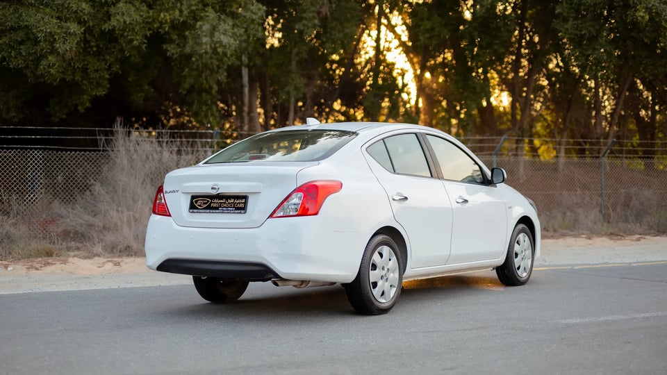 Used 2024 Nissan Sunny SV in White – Right Back Diagonal (45°) View for Sale at First Choice Cars Dubai Sharjah