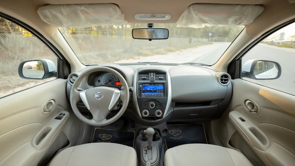Used 2024 Nissan Sunny SV in White – Front Cabin / Dashboard Full View for Sale at First Choice Cars Dubai Sharjah