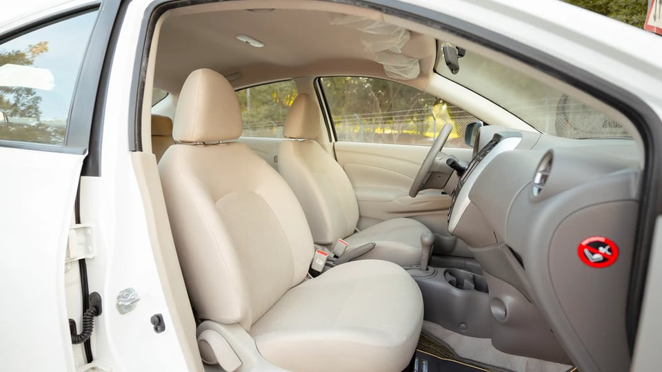 Used 2024 Nissan Sunny SV in White – Front Passenger Side Cabin View for Sale at First Choice Cars Dubai Sharjah