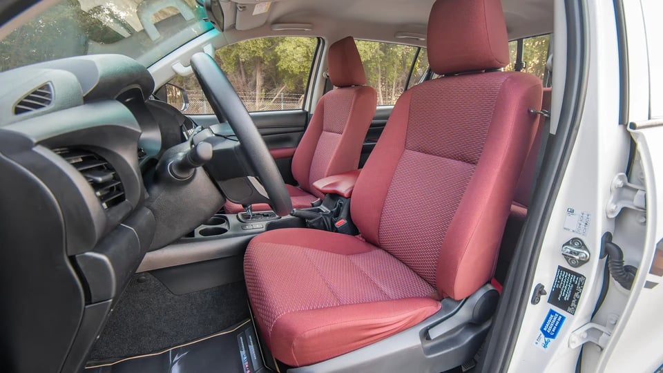 Used 2024 Toyota Hilux DLX Double Cabin in White – Front Driver Side Cabin View for Sale at First Choice Cars Dubai Sharjah