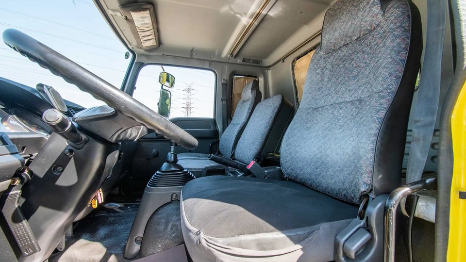 Used 2016 Isuzu FSR Cargo Body in Yellow – Front Driver Side Cabin View for Sale at First Choice Cars Dubai Sharjah