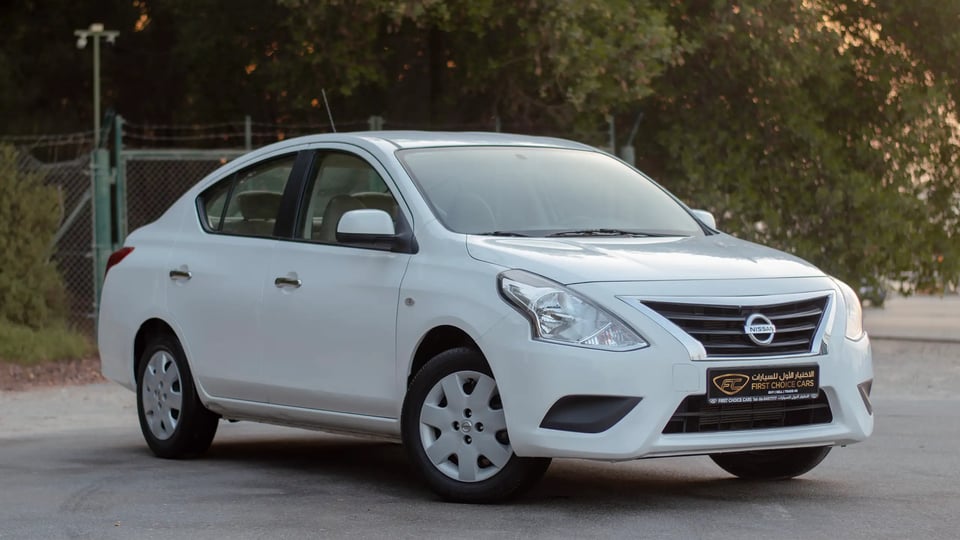 Used 2023 Nissan Sunny SV in White – Right Front Diagonal (45°) View for Sale at First Choice Cars Dubai Sharjah