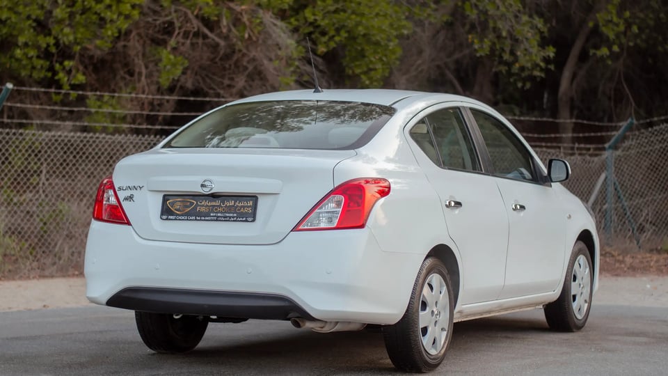 Used 2023 Nissan Sunny SV in White – Right Back Diagonal (45°) View for Sale at First Choice Cars Dubai Sharjah
