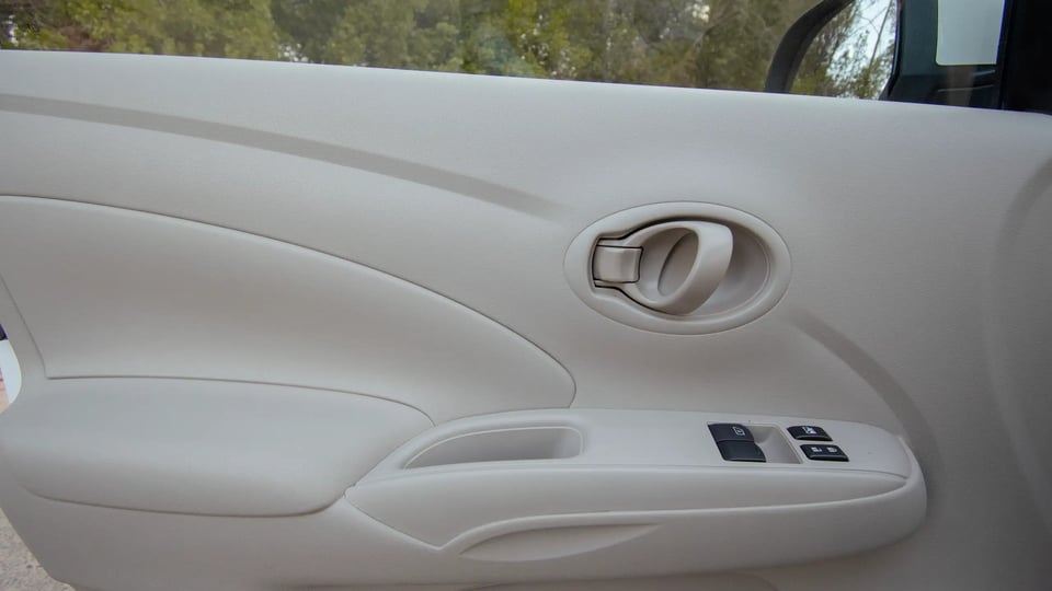 Used 2023 Nissan Sunny SV in White – Driver Door Panel Full View for Sale at First Choice Cars Dubai Sharjah