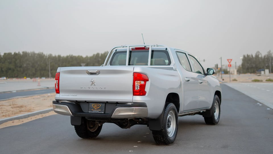 Used 2023 Peugeot Landtrek Double Cabin in Silver – Right Back Diagonal (45°) View for Sale at First Choice Cars Dubai Sharjah