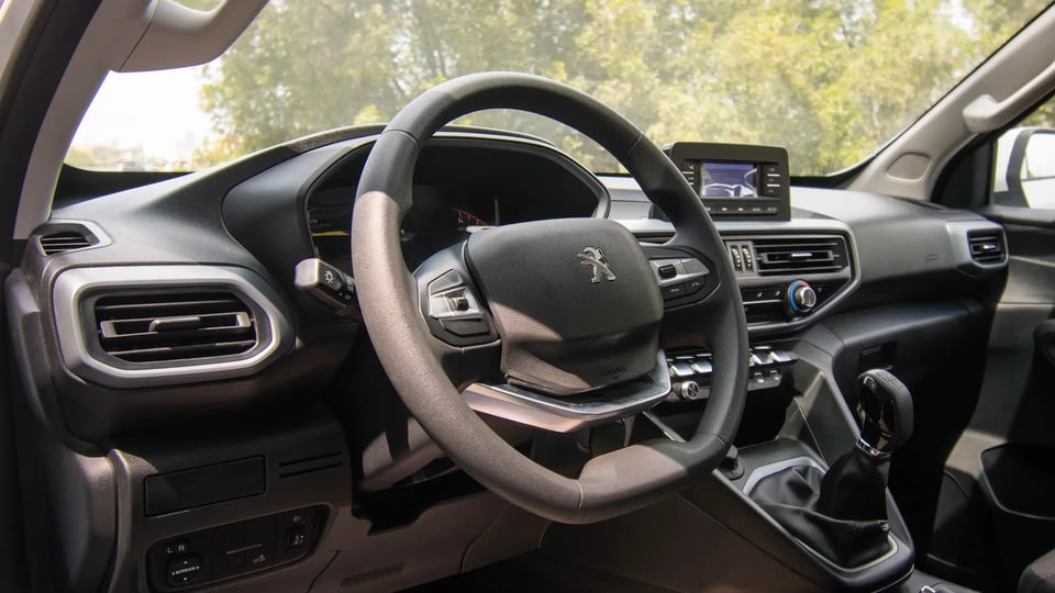 Used 2023 Peugeot Landtrek Double Cabin in Silver – Driver Side Dashboard & Steering View for Sale at First Choice Cars Dubai Sharjah