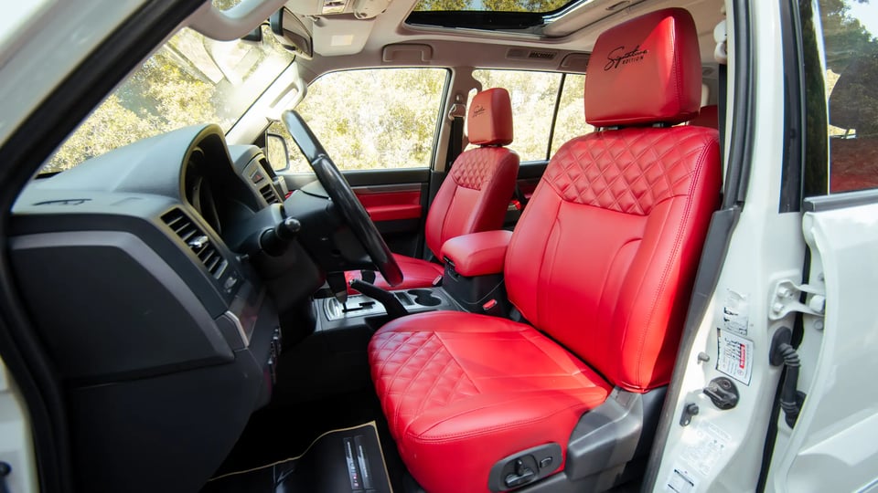 Used 2022 Mitsubishi Pajero GLS in White – Front Driver Side Cabin View for Sale at First Choice Cars Dubai Sharjah